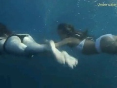 UhEbony presents: Bikini girls filmed underwater in the ocean