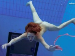 UhEbony presents: Curly hair redhead swims and looks sexy