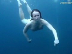UhEbony presents: Three ladies get naked swimming in the ocean