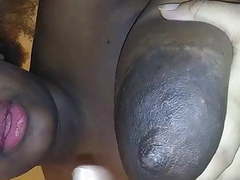 UhEbony presents: Mature ebony shoots milk out of her huge boob