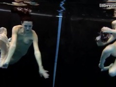 UhEbony presents: Skinny teens swim in the deep pool naked