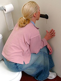 UhEbony presents: Blonde girl Jamie sits on the toilet and blows a black gloryhole dong